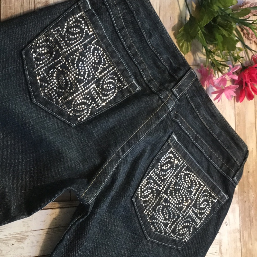 Bebe jeans dark wash size 27. in good condition